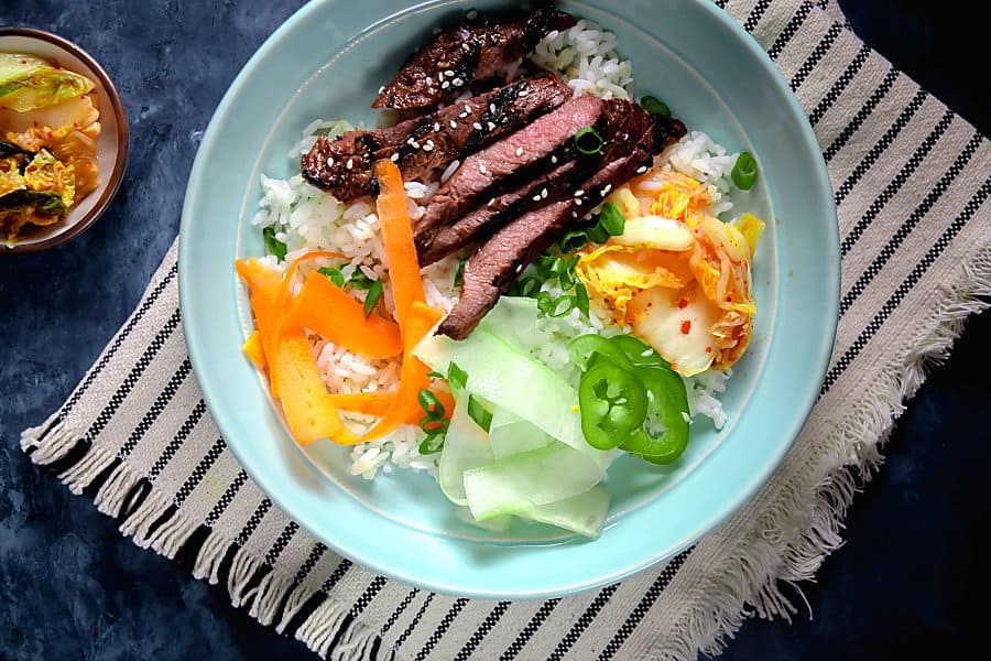 Korean Barbecue Steak Bowls on Blue Plate