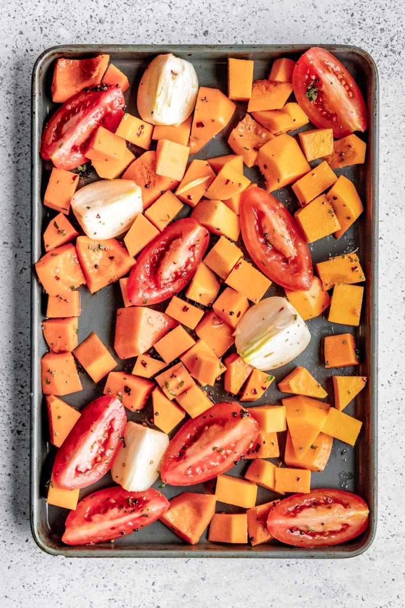 The vegetables arranged on a baking sheet. 